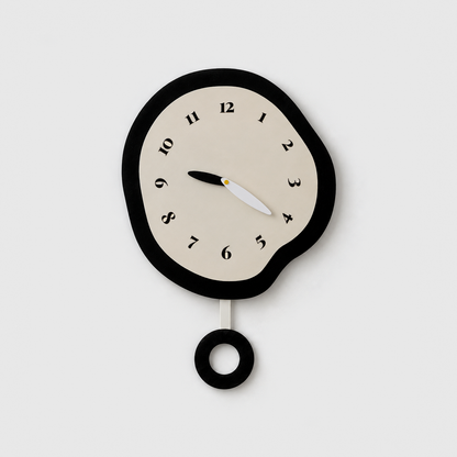 A black and cream abstract wall clock with a warped outline and a black ring pendulum, on a light grey wall