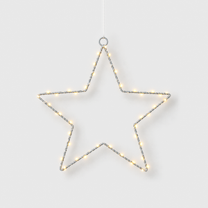 LED star light hanging from its top ring, its warm white beads lit, on a light gray background