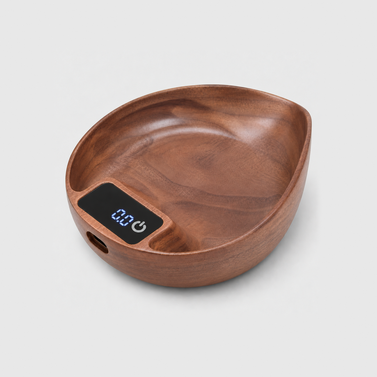 Walnut coffee scale and dosing cup with a lit LED display in the wide end and a pointed pour spout, on a light gray background