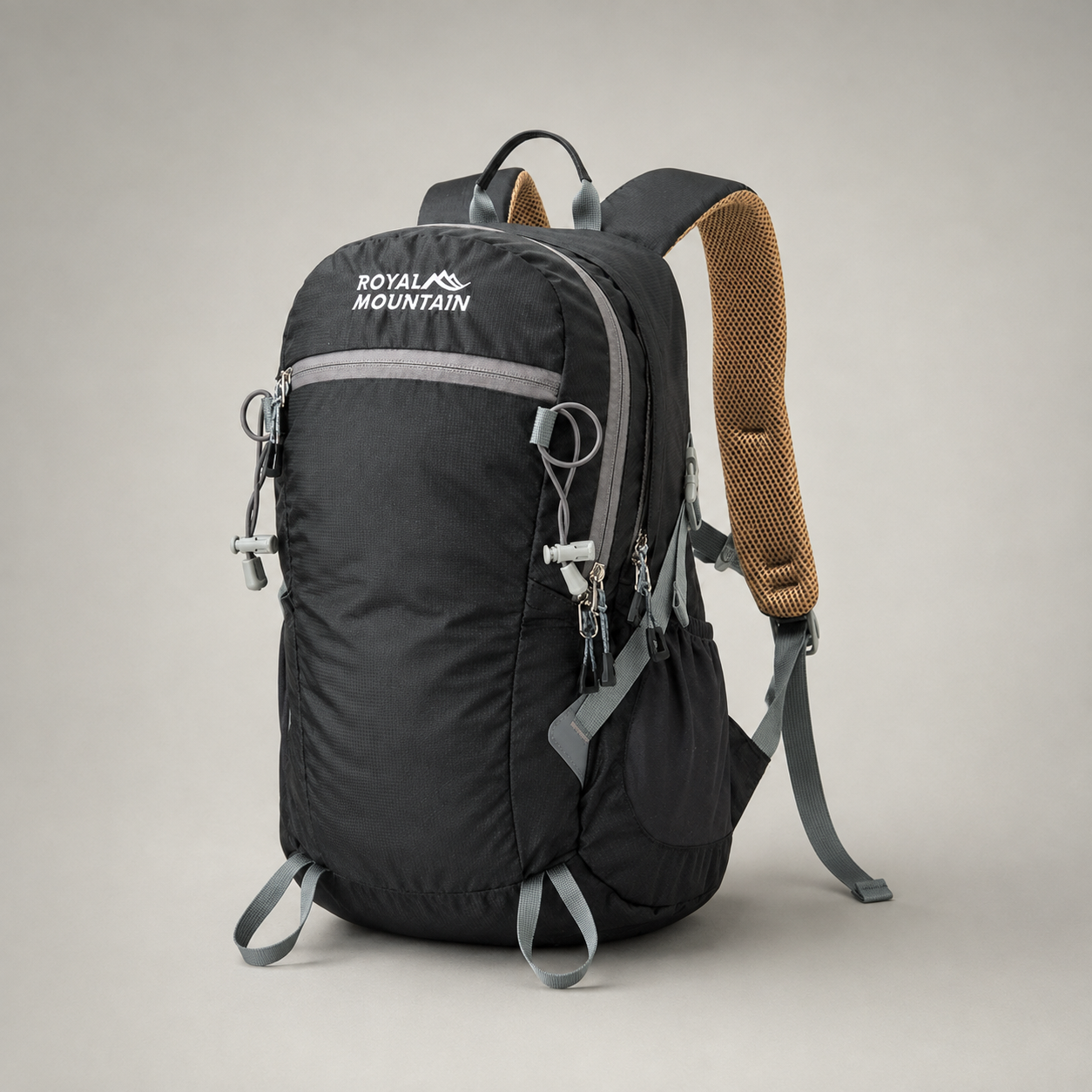Studio photograph of the black 30L hiking day pack from the front, showing the front zip pockets, grey trim and side compression straps