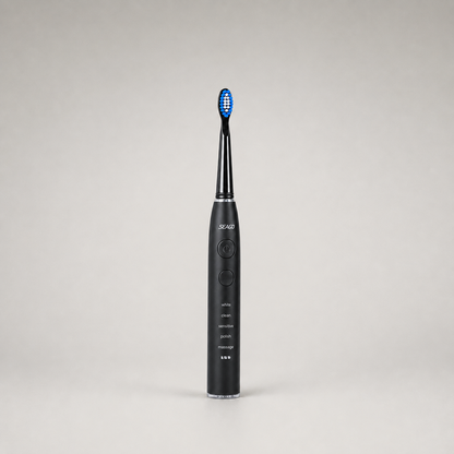 Electric toothbrush with its brush head fitted, shown front on
