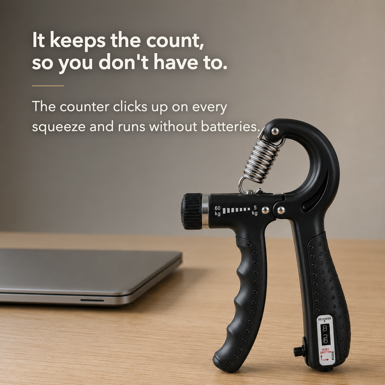 Black hand gripper on a desk below the words It keeps the count, so you don't have to