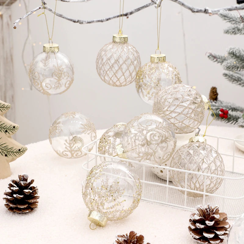 Clear champagne glitter baubles hanging on gold thread from a branch above a wire basket and pine cones