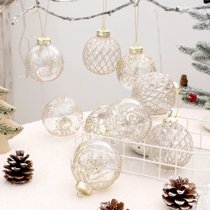 Clear champagne glitter baubles hanging on gold thread from a branch above a wire basket and pine cones