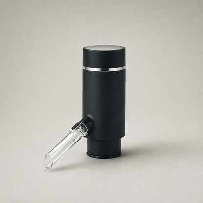 Electric wine aerator and dispenser in matte black, studio view showing the clear ribbed acrylic spout