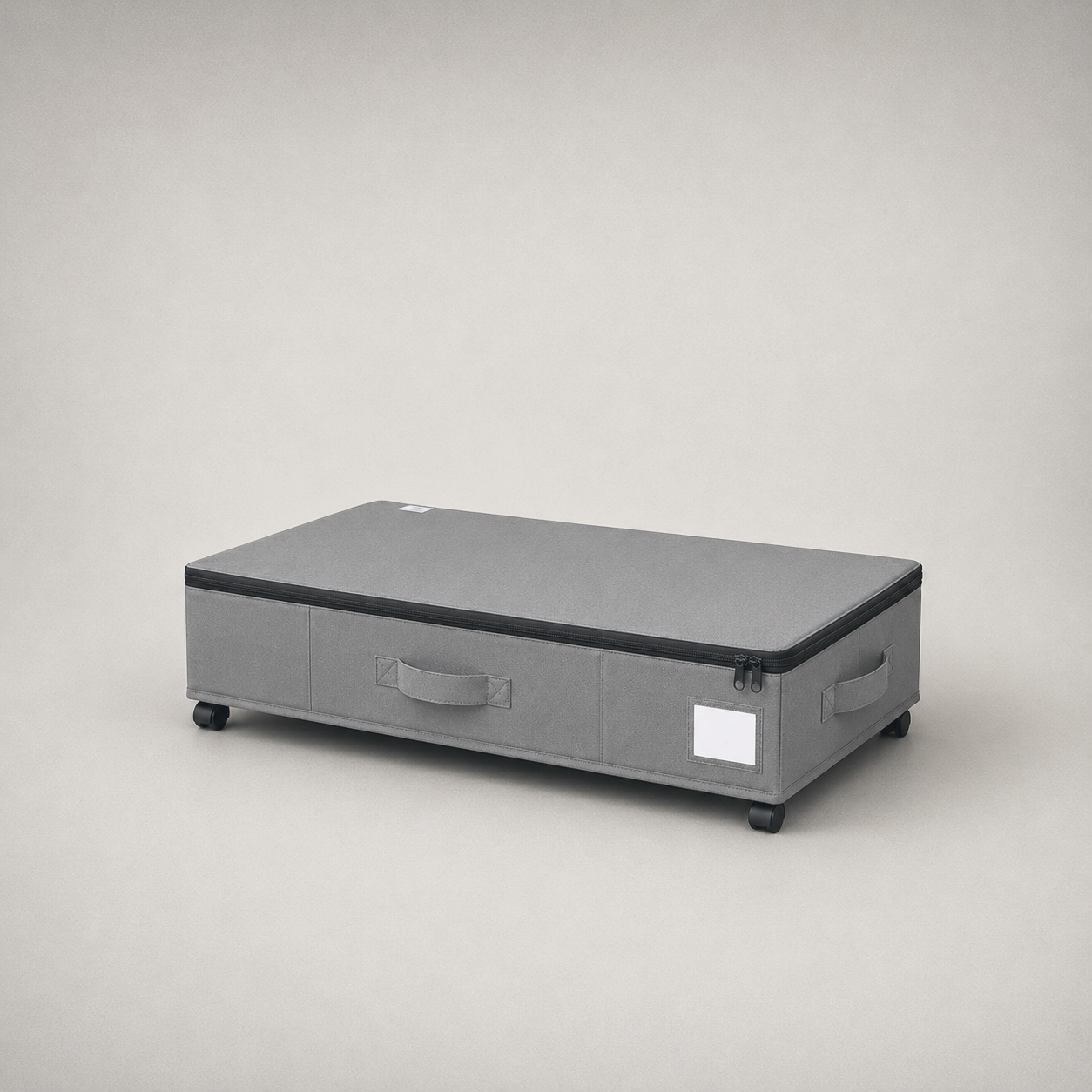 Gray under bed storage box, three-quarter studio view on a plain gray background, zippered lid closed and a castor at each corner.