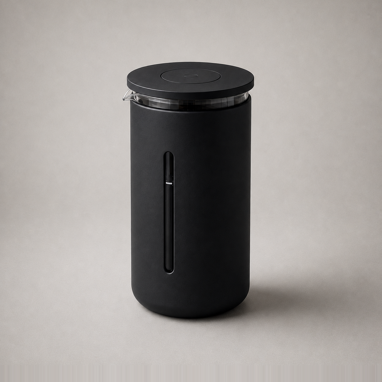 Studio photograph of the black French press coffee maker on a plain grey background.