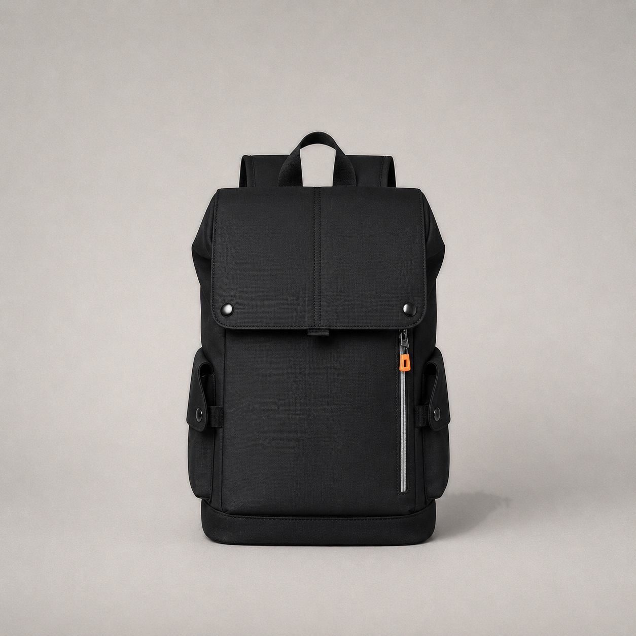 Studio front view of the black business backpack on a plain warm grey background