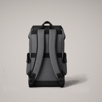Studio rear view of the black and gray backpack showing the padded straps, grab handle and luggage band