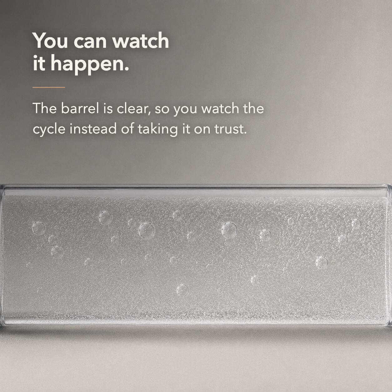 Claim card. Close view of the clear barrel with a dense skin of tiny bubbles and larger round bubbles in the water, under the words You can watch it happen
