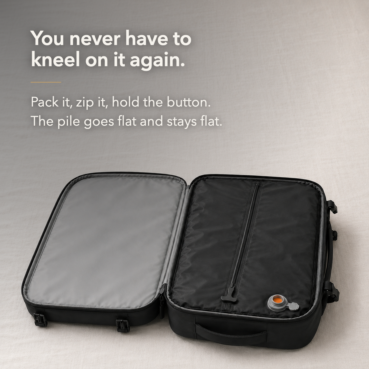 The backpack open flat on a linen bed, its sealed black compression chamber with one zip and the grey air valve, and the words You never have to kneel on it again
