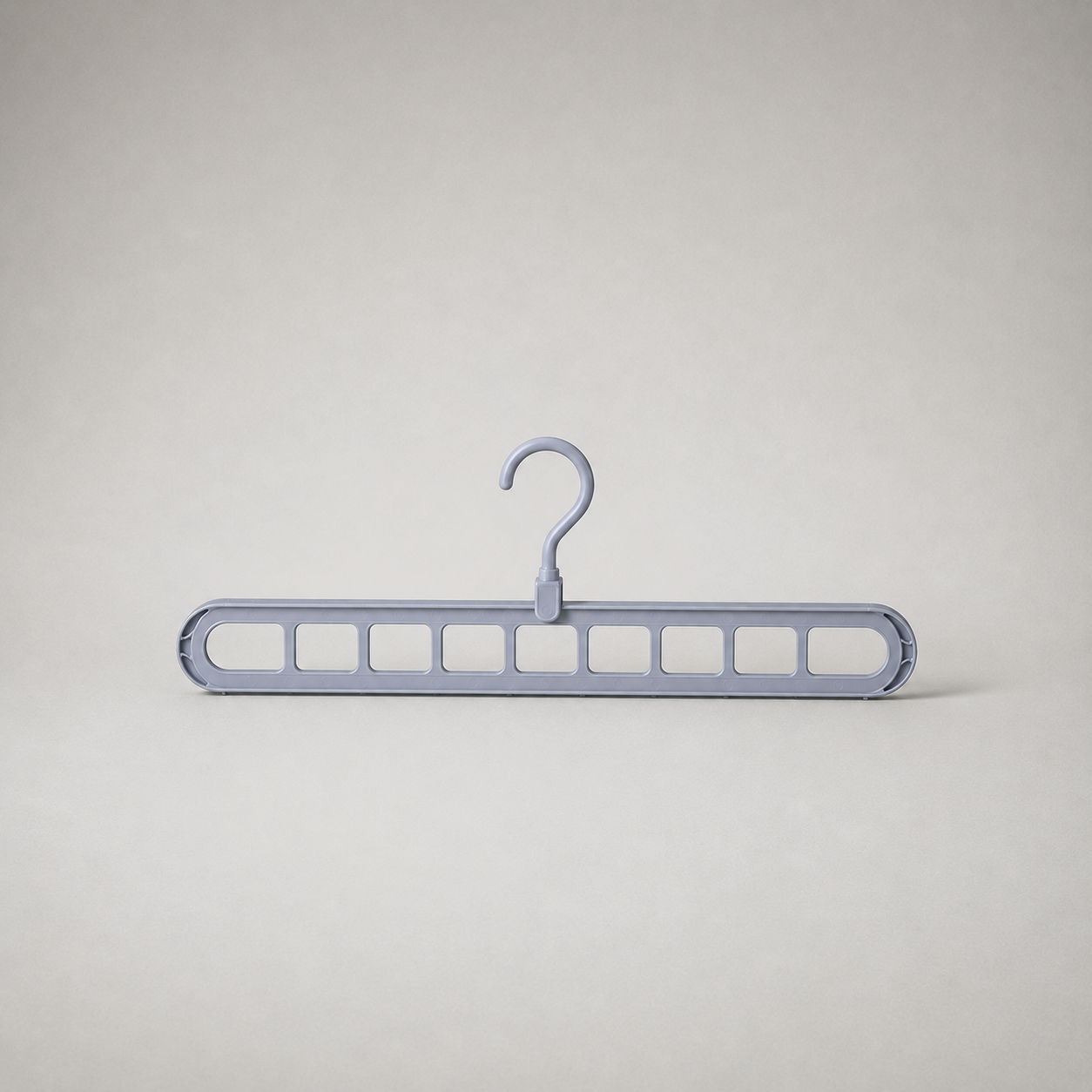 Gray nine-slot hanger shown front on against a plain grey background, hook uppermost