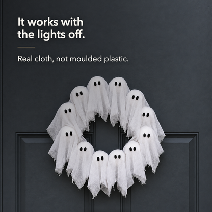 Works with the lights off. White ghost cloth that still reads as a wreath in daylight