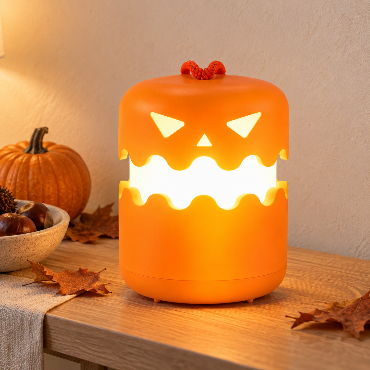 Pumpkin lantern lit and open on a hallway console table in the evening