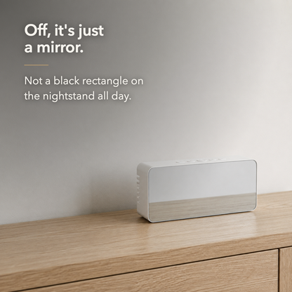 The mirror alarm clock with its display off, the front reading as a plain mirror rather than a screen