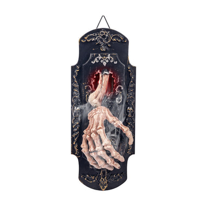 Black Halloween door decoration on a plain white background, a skeleton hand reaching out of a red tear in the panel with mist drifting over the fingers