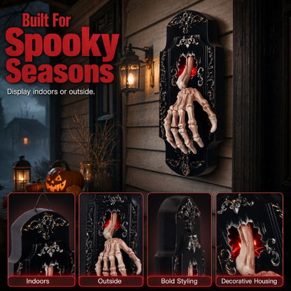Halloween door decoration on house siding at night, with close views of the gold scrollwork crest, the hanging cord, the side of the plaque and the torn red opening