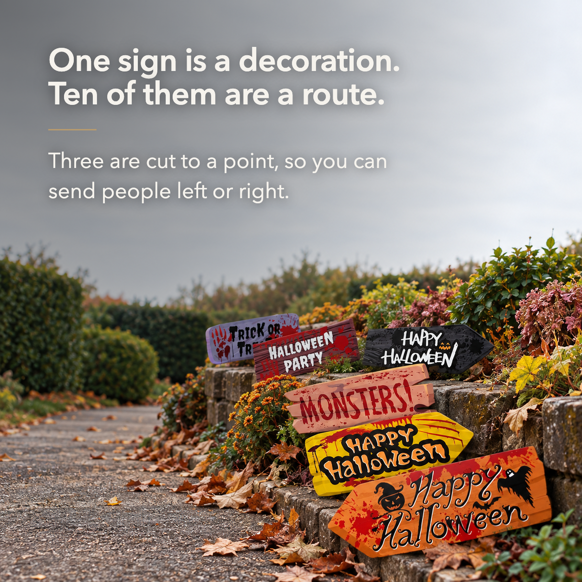 Halloween signs along a garden path, with the words one sign is a decoration, ten of them are a route