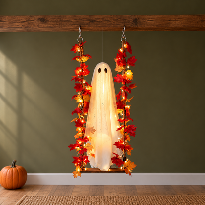 Lit ghost swing hanging from a wooden beam in a bright entrance hall against an olive green wall