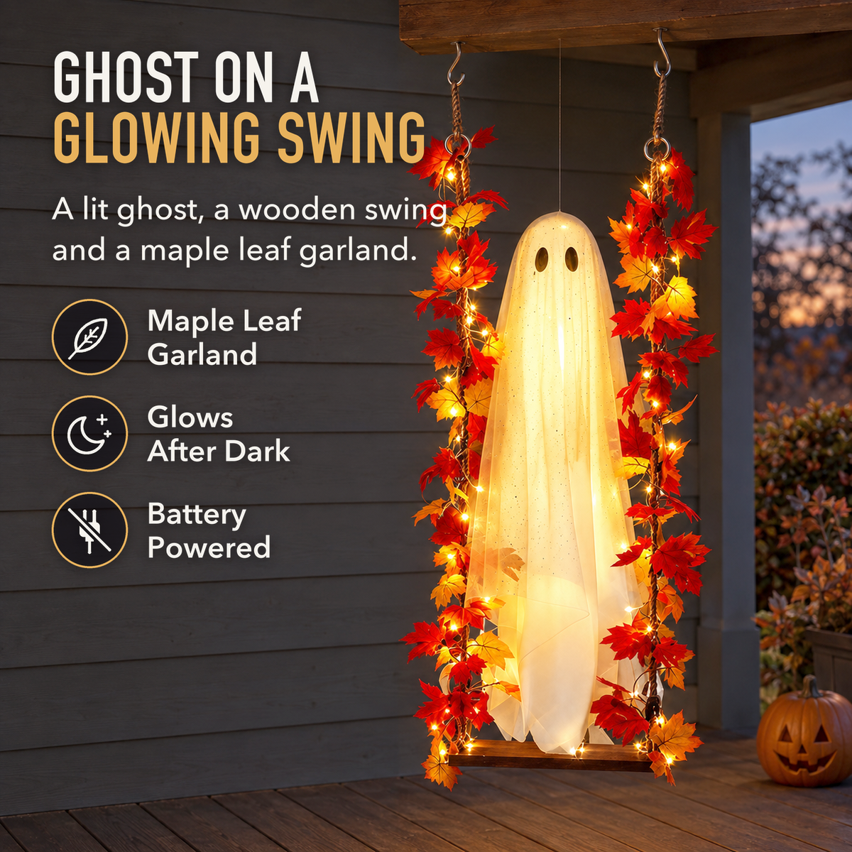 Lit ghost swing hanging on a porch at dusk with maple leaves and warm lights on both ropes, with the words Ghost on a Glowing Swing, Maple Leaf Garland, Glows After Dark and Battery Powered