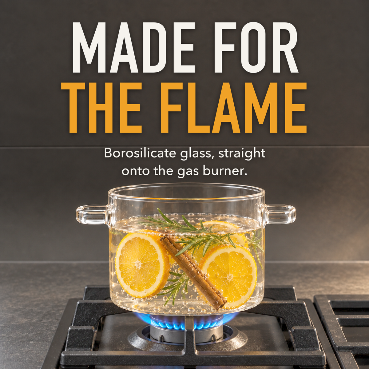 Clear glass cooking pot of water and orange slices over a blue gas flame, with the words Made For The Flame