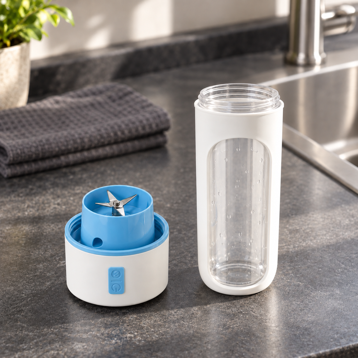 Portable blender cup taken apart beside a sink, the blue cap standing upside down to show its stainless steel blade next to the empty rinsed cup