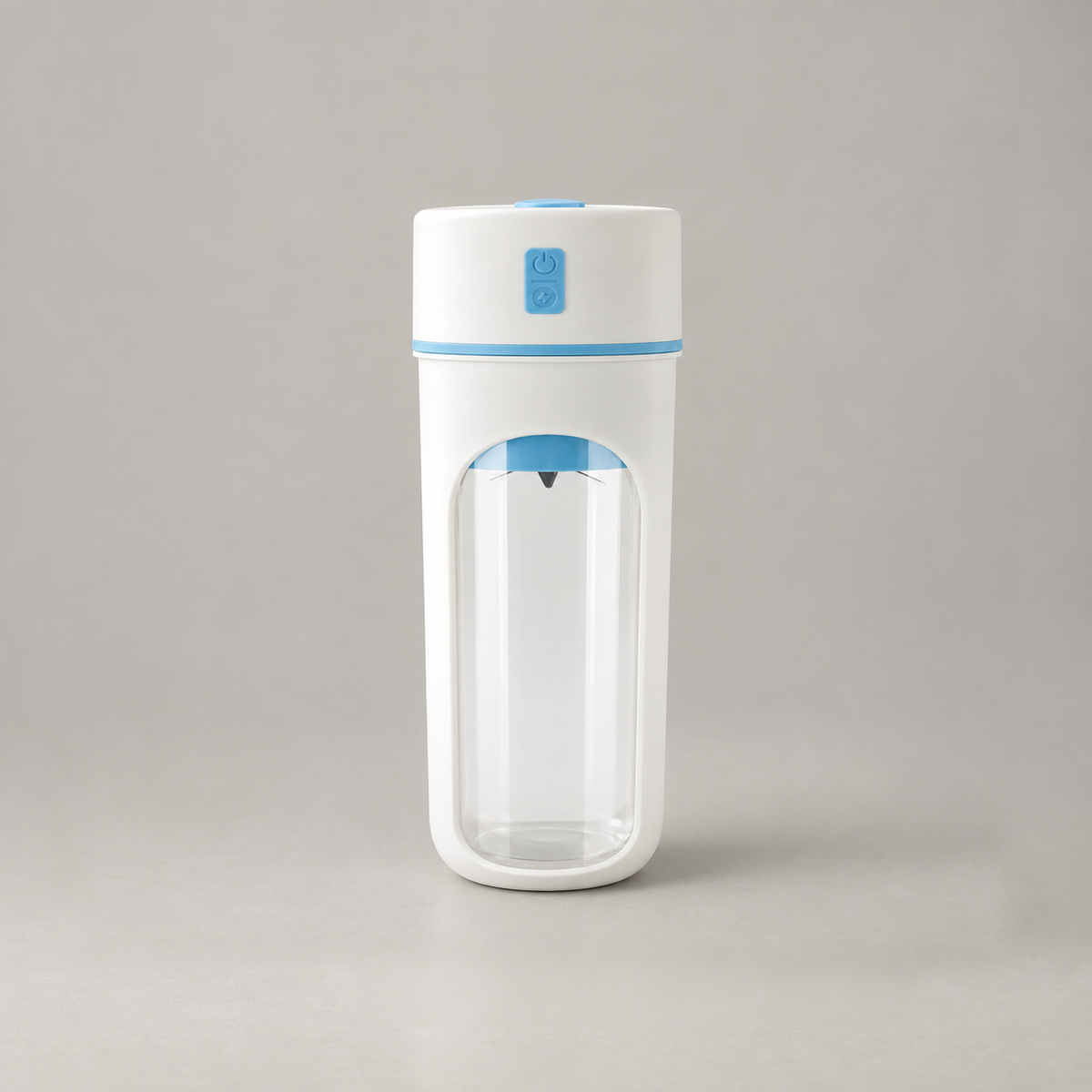 Portable blender cup with blue trim on a plain grey background, showing the button pad on the cap and the viewing window in the white sleeve