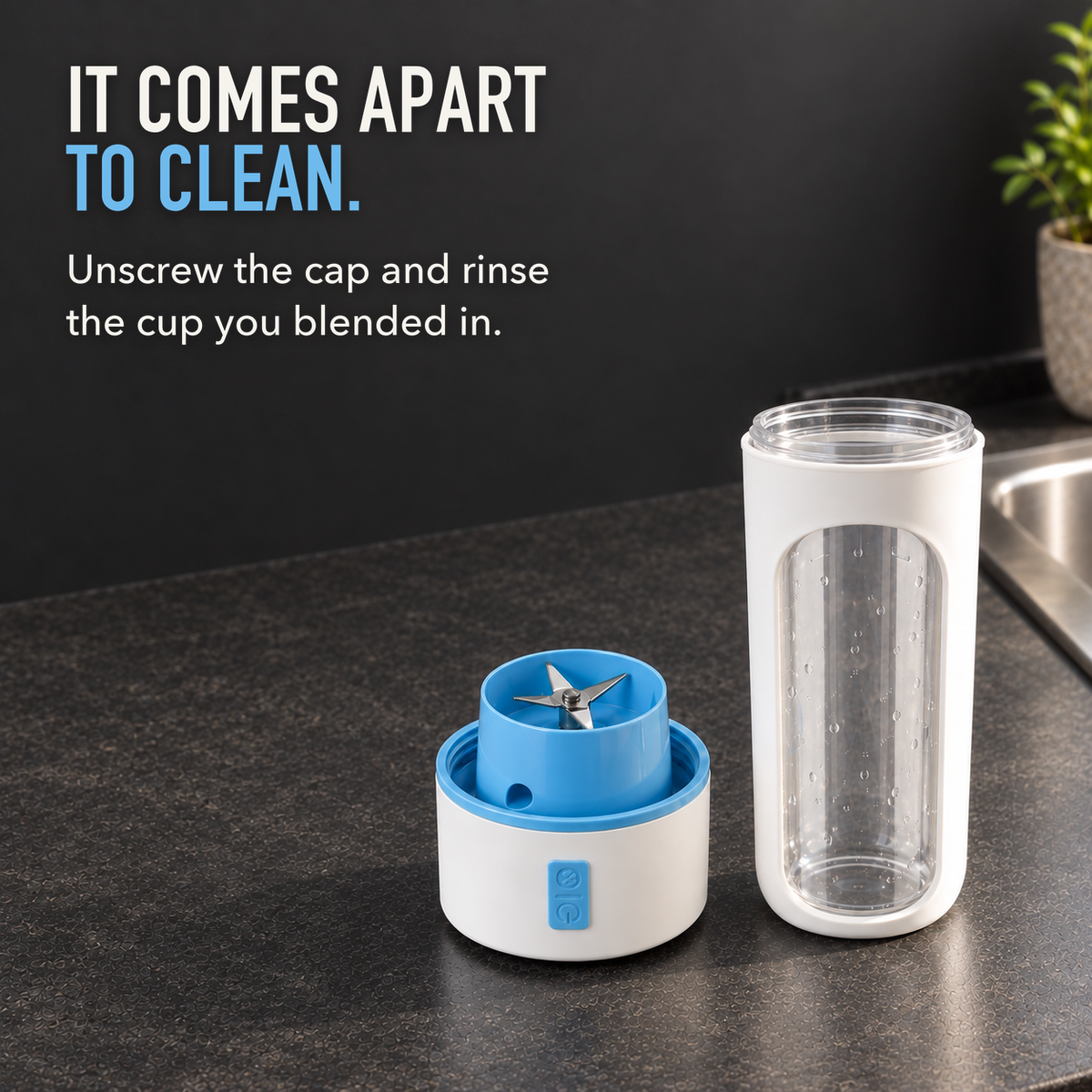 The portable blender cup taken apart by a sink, the blue cap upside down showing its stainless steel blade beside the empty rinsed cup, with the words It Comes Apart To Clean.