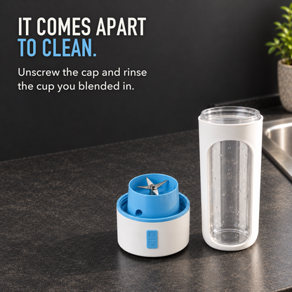 The portable blender cup taken apart by a sink, the blue cap upside down showing its stainless steel blade beside the empty rinsed cup, with the words It Comes Apart To Clean.