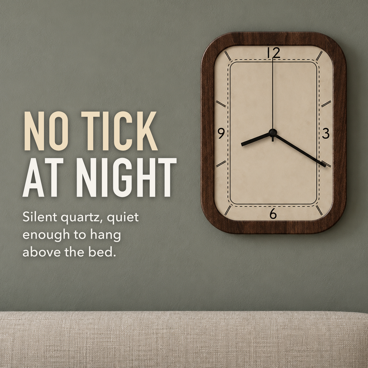 Text image: No tick at night. A rectangular wall clock with rounded corners hanging above a bed, with a silent quartz movement