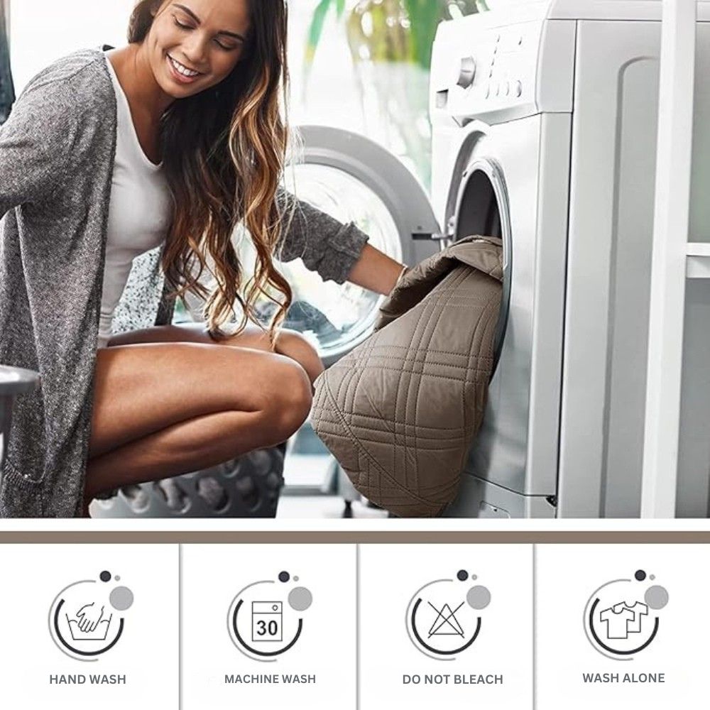 Quilted recliner slipcover going into a washing machine, with hand wash, machine wash, no bleach and wash alone symbols