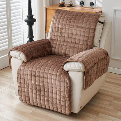Brown grid quilted recliner cover on a cream leather recliner by a window