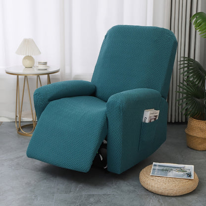 Teal stretch jacquard recliner cover fitted over a single recliner with the footrest raised
