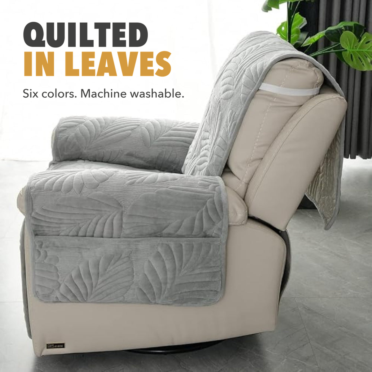 Card reading quilted in leaves, six colors, machine washable, over a gray leaf quilted recliner cover seen from the side