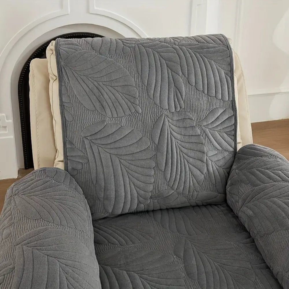 Close view of the leaf quilting on a charcoal recliner cover backrest