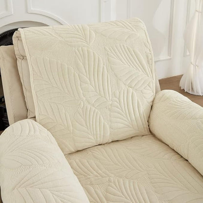 Close view of the leaf quilting on a beige recliner cover backrest and arms