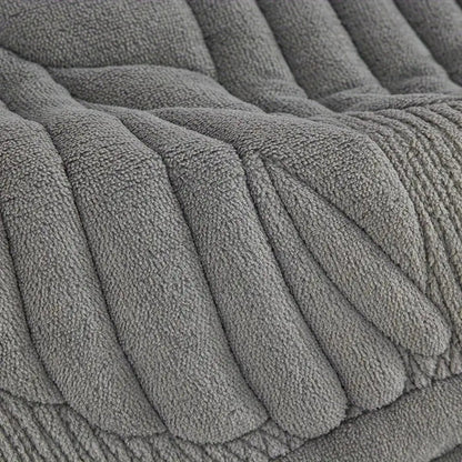 Macro of the soft pile and padded leaf ribs on the charcoal recliner cover