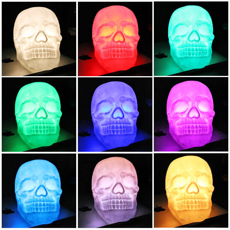 Skull night light shown lit in nine colors: warm white, red, cyan, green, blue, magenta, sky blue, pink and amber
