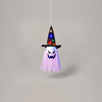 Single witch hat ghost light hanging straight down from a cord on a plain grey background