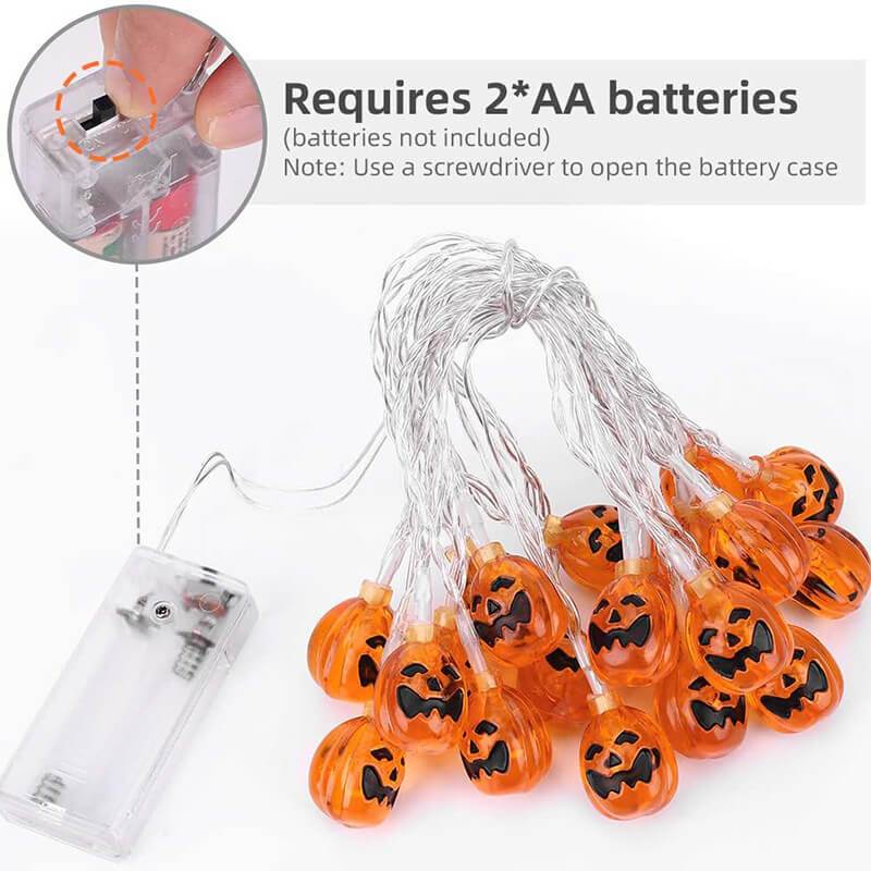 Unlit orange jack-o'-lantern string lights on a clear wire with a clear battery box that takes two AA batteries, batteries not included