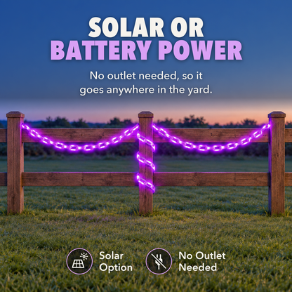 Purple glowing chain light swagged along a wooden garden fence at dusk, with the words Solar or battery power