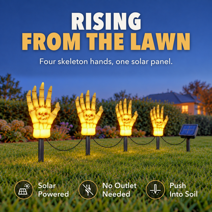 Four glowing skeleton hand stake lights rising from an open lawn at dusk, with the words Rising from the lawn, Four skeleton hands, one solar panel