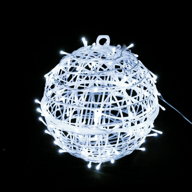 A cool white LED ball light on a black background, showing its woven strips and hanging loop