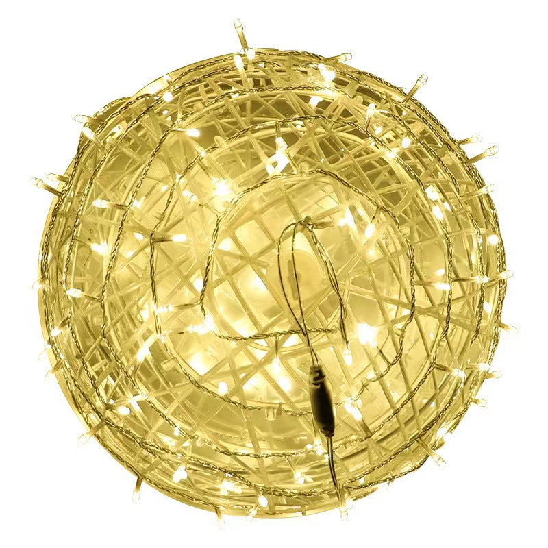 A warm white LED ball light on a white background
