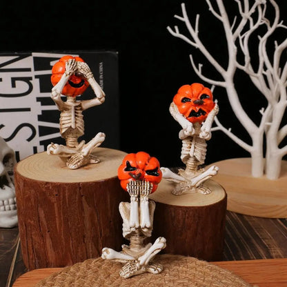 Pumpkin head skeleton figurines on wooden stumps and a jute mat beside a white branch ornament