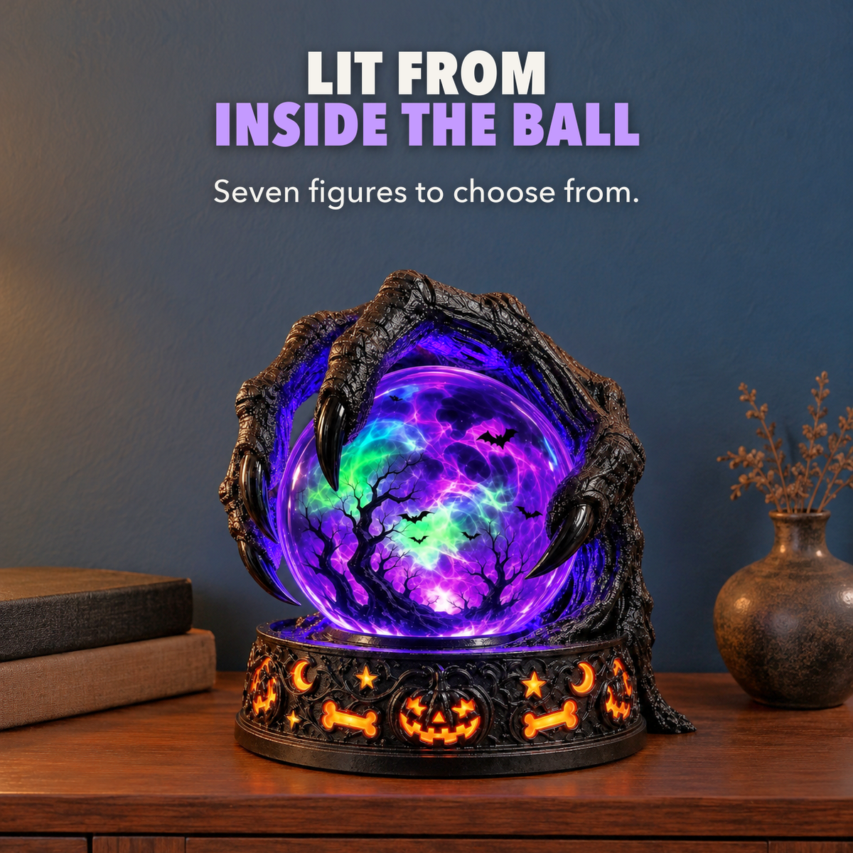 Claw crystal ball lamp glowing purple on a dark bookcase at evening, with the words Lit from inside the ball
