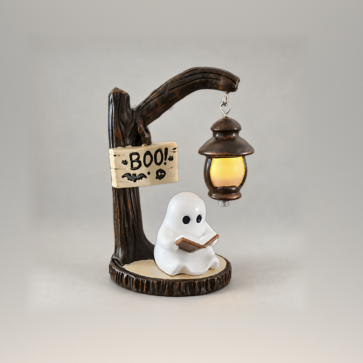 Reading ghost lantern light from the front on a plain grey background, the lantern lit