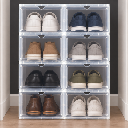Eight translucent shoe boxes stacked two wide and four high in a closet, a different pair of shoes in each