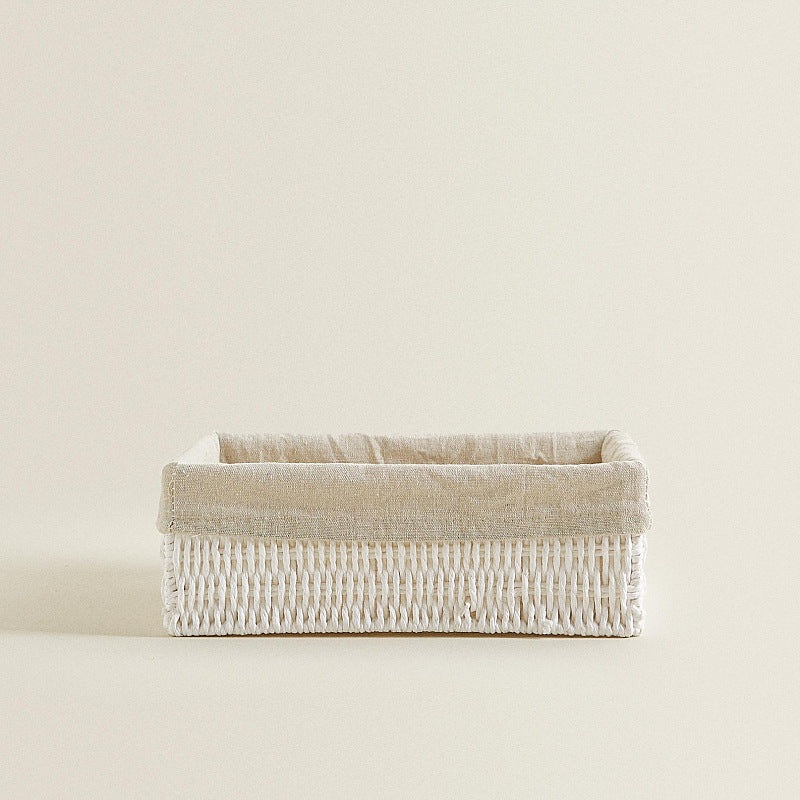 Small woven storage bin, 11.02 x 7.87 x 3.94 inches, white weave with a beige fabric liner folded over the rim