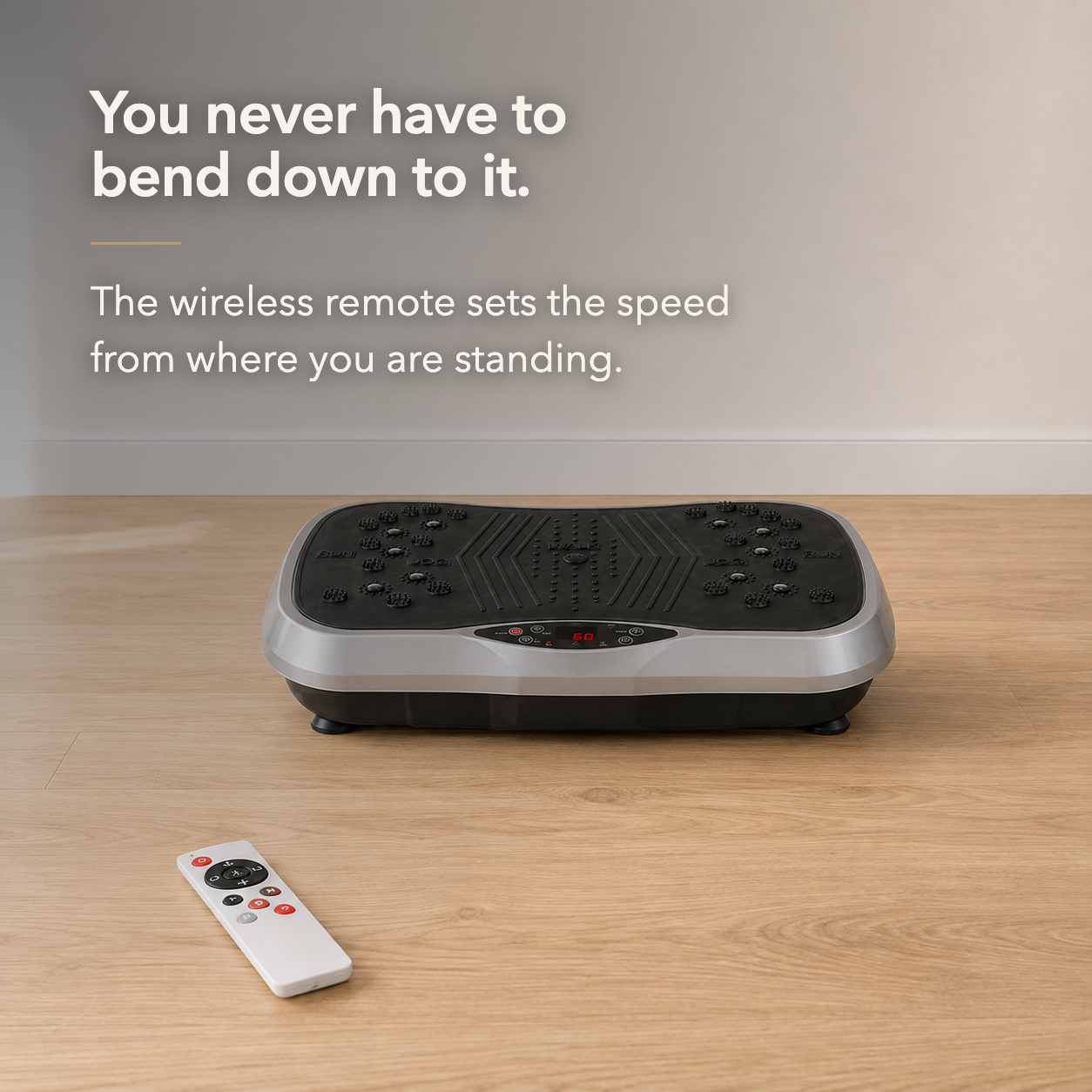Vibration plate running on a living room floor with the wireless remote lying in the foreground
